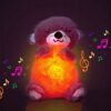 Детская мягкая интерактивная  игрушка "Выдра" дышащая, ночник музыкальный для сна с подсветкой, розовый
